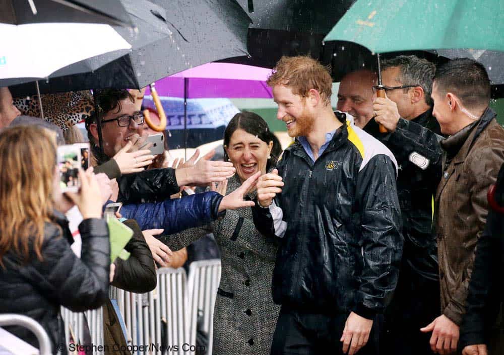 Prince-Harry-Sydney-Royal-visit-with-Premier-Gladys-Berejiklian-in heavy-rain.-pic-Stephen-Cooper_News-Corp_web